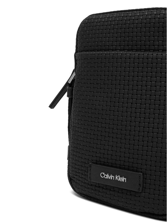 Calvin Klein Crossover torbica Calvin Klein Embossed Woven Slim Reporter LV04D3221G Crna