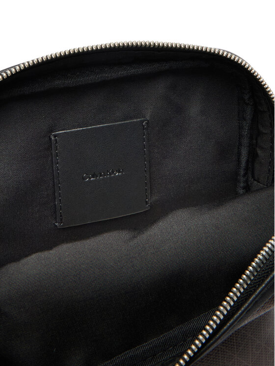 Calvin Klein Torbica za okrog pasu Calvin Klein Emblem Aop Coated Slim Reporter LV04D3334G Rjava