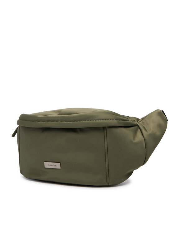 Calvin Klein Torbica za okrog pasu﻿ Calvin Klein Sleek Waistbag Sling LV04D3148G Zelena