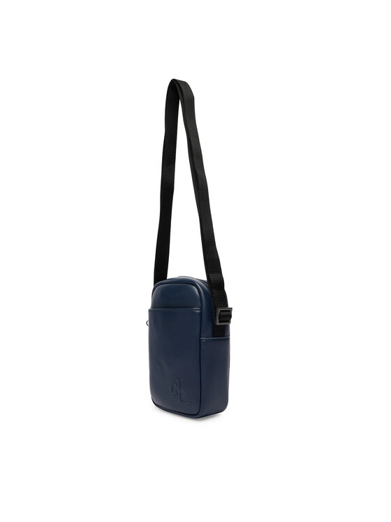 Calvin Klein Ľadvinka Calvin Klein Bold Ck Slim Reporter LV04D3279G Tmavomodrá