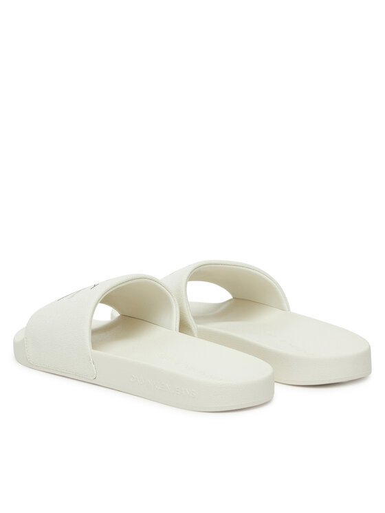Calvin Klein Jeans Klapki Calvin Klein Jeans Slide Monologo Cv YM0YM01367 Biały