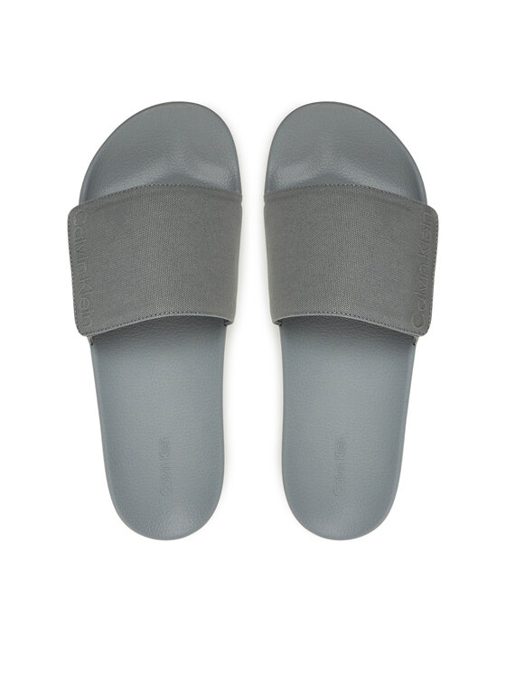 Calvin Klein Šľapky Calvin Klein Adj Pool Slide Canvas Logo HM0HM01749 Sivá