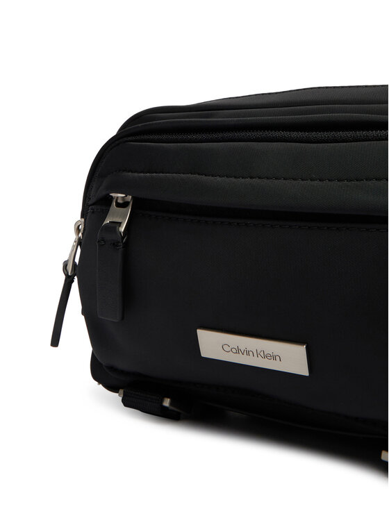 Calvin Klein Torbica za okrog pasu Calvin Klein Sleek Utility Camera Bag LV04D3339G Črna