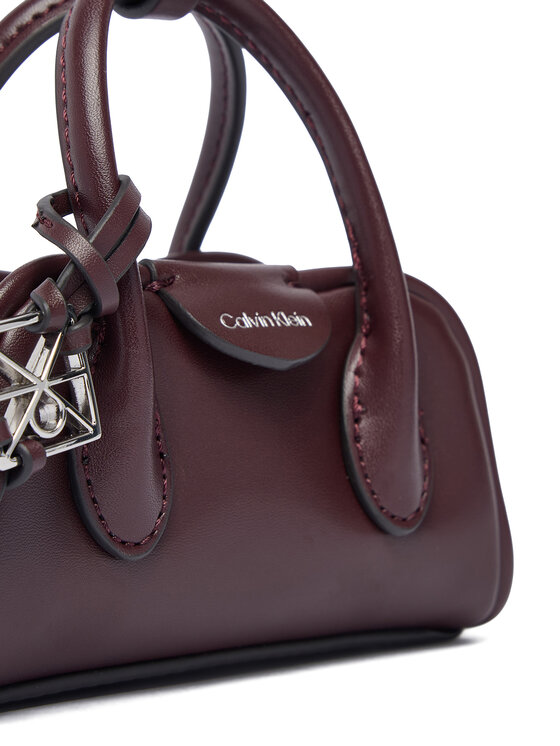 Calvin Klein Přívěsek Calvin Klein Emblem Trio Mini Bag Charm LV04F1315G Bordó