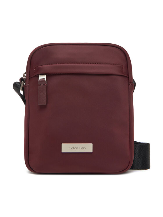 Calvin Klein Saszetka Calvin Klein Sleek Reporter LV04D3180G Bordowy