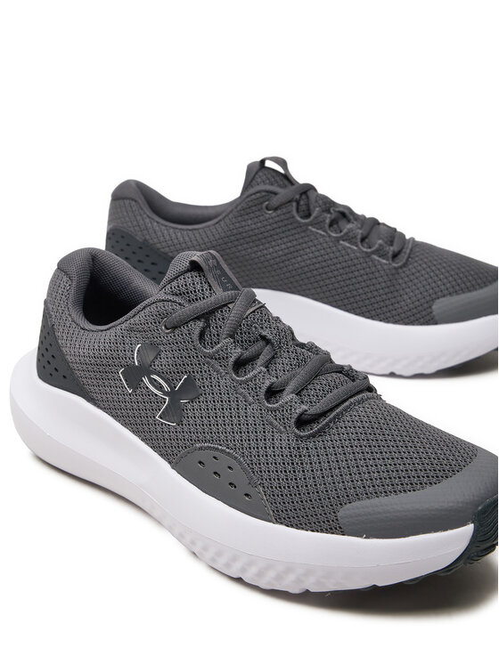 Under Armour Tekaški čevlji Under Armour UA BGS Surge 4 3027103-101 Siva