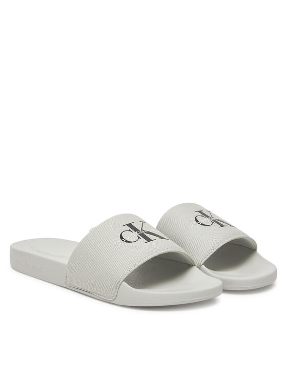 Calvin Klein Jeans Šľapky Calvin Klein Jeans Slide Monogram Cv YM0YM01271 Sivá
