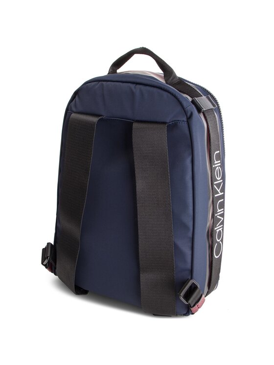 Calvin Klein Nahrbtnik Calvin Klein Clash Round Backpack K50K504197 Mornarsko modra