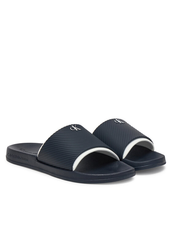 Calvin Klein Jeans Şlapi Calvin Klein Jeans Slide Rubber Neoprene Text YM0YM01234 Bleumarin