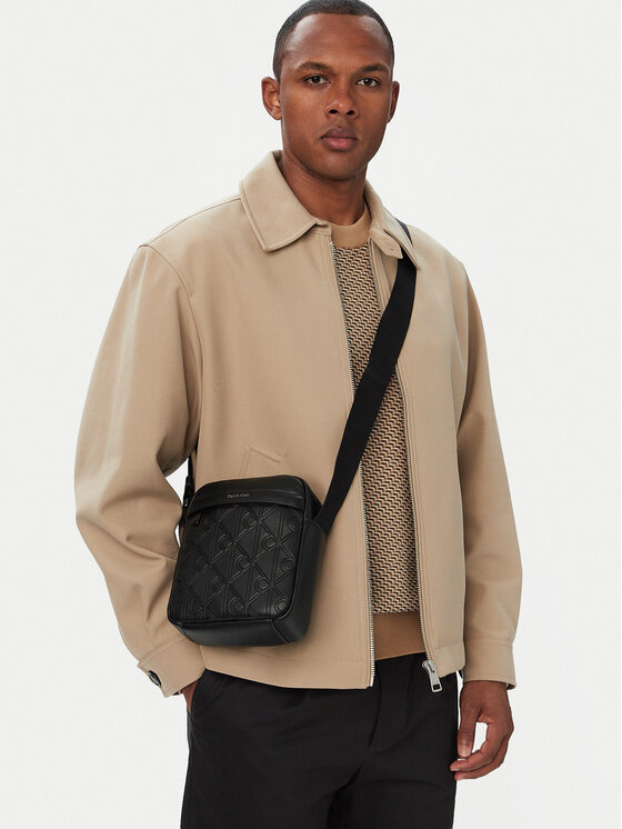 Calvin Klein Válltáska Calvin Klein Emblem Aop Deboss Reporter LV04D3562G Fekete