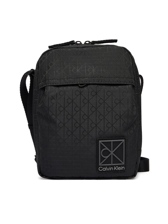 Calvin Klein Torbica za okrog pasu Calvin Klein Utility Emblem Reporter LV04D3303G Črna