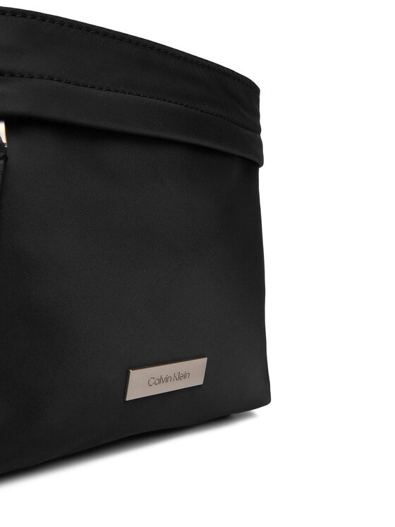 Calvin Klein Torbica za okrog pasu Calvin Klein Sleek Slim Flatpack LV04D3234G Črna