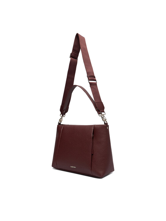 Torebka widziana pod kątem, widoczny długi pasek u góry.